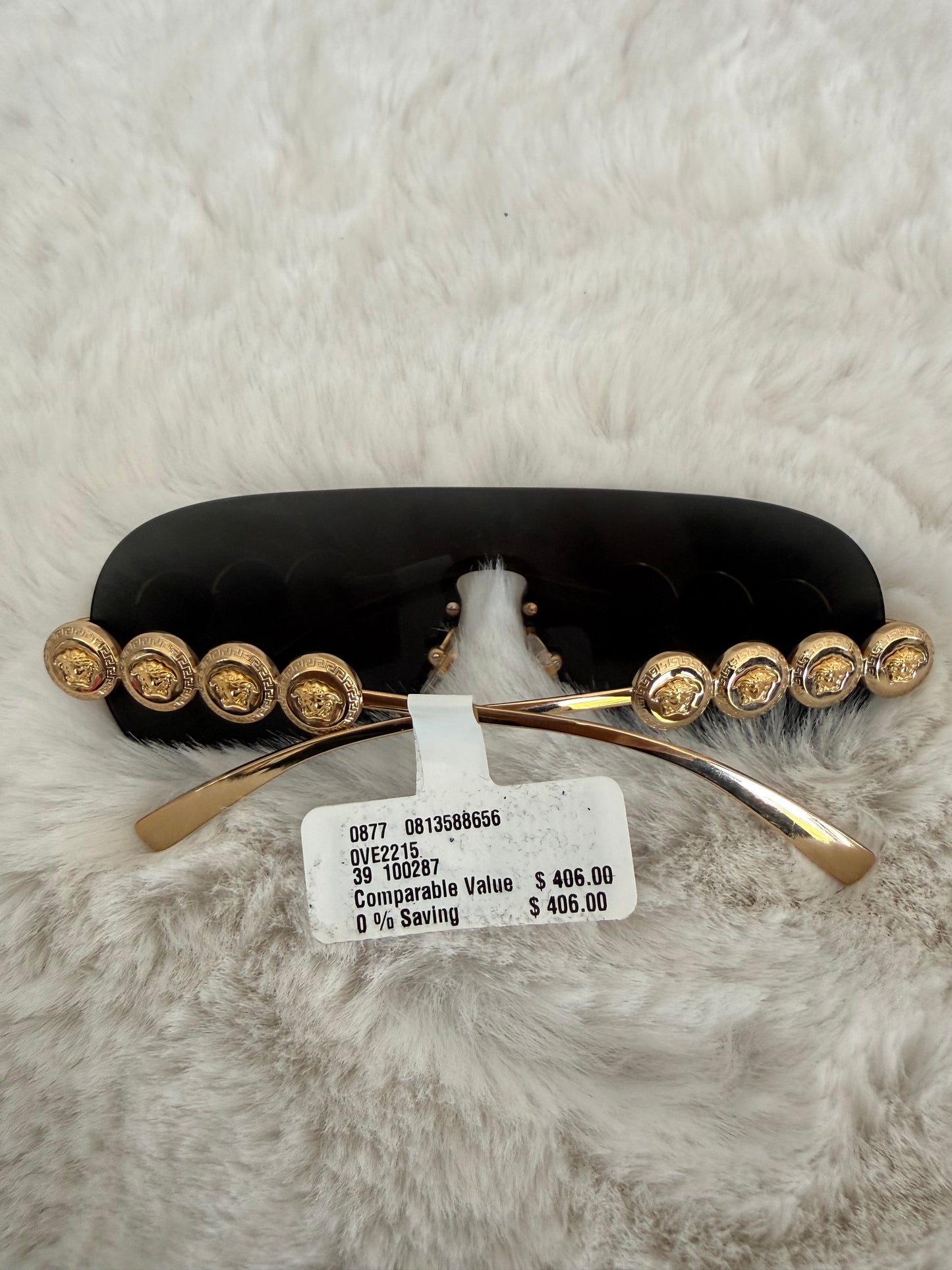 Lentes armazón dorado marca Versace unisex