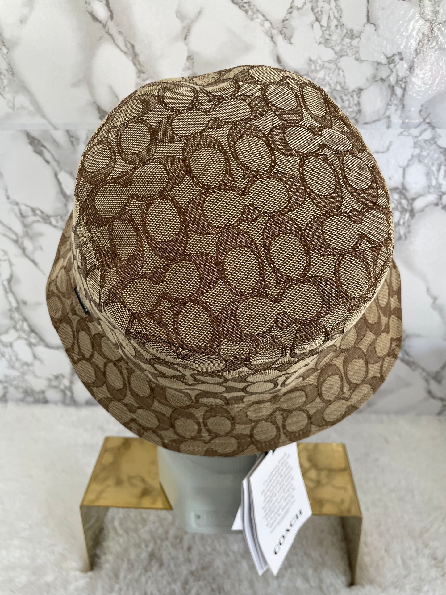 Gorro en tela marca Coach