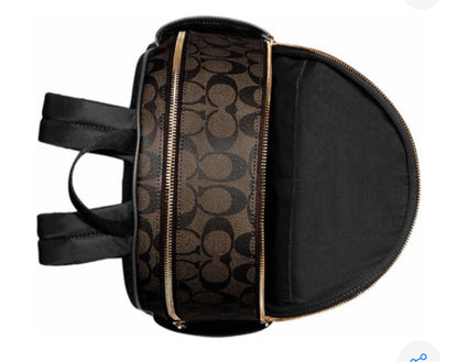 Mochila tipo piel marca Coach monogram