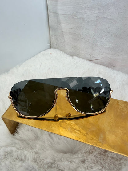 Lentes armazón dorado marca Versace unisex