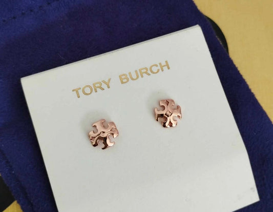Aretes chico oro rosado marca Tory Burch