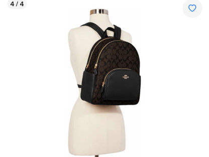 Mochila tipo piel marca Coach monogram