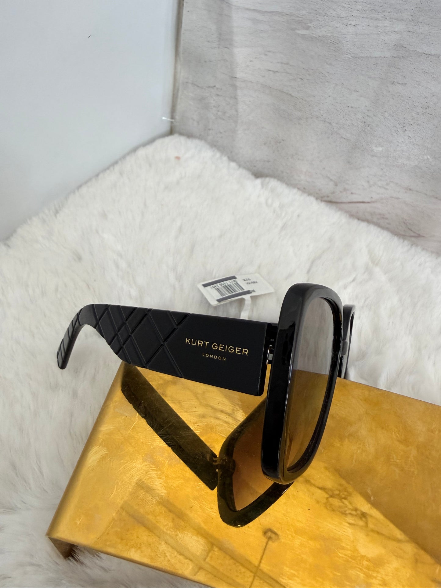 Lentes de dama marca Kurt Geiger con estuche de bolsa