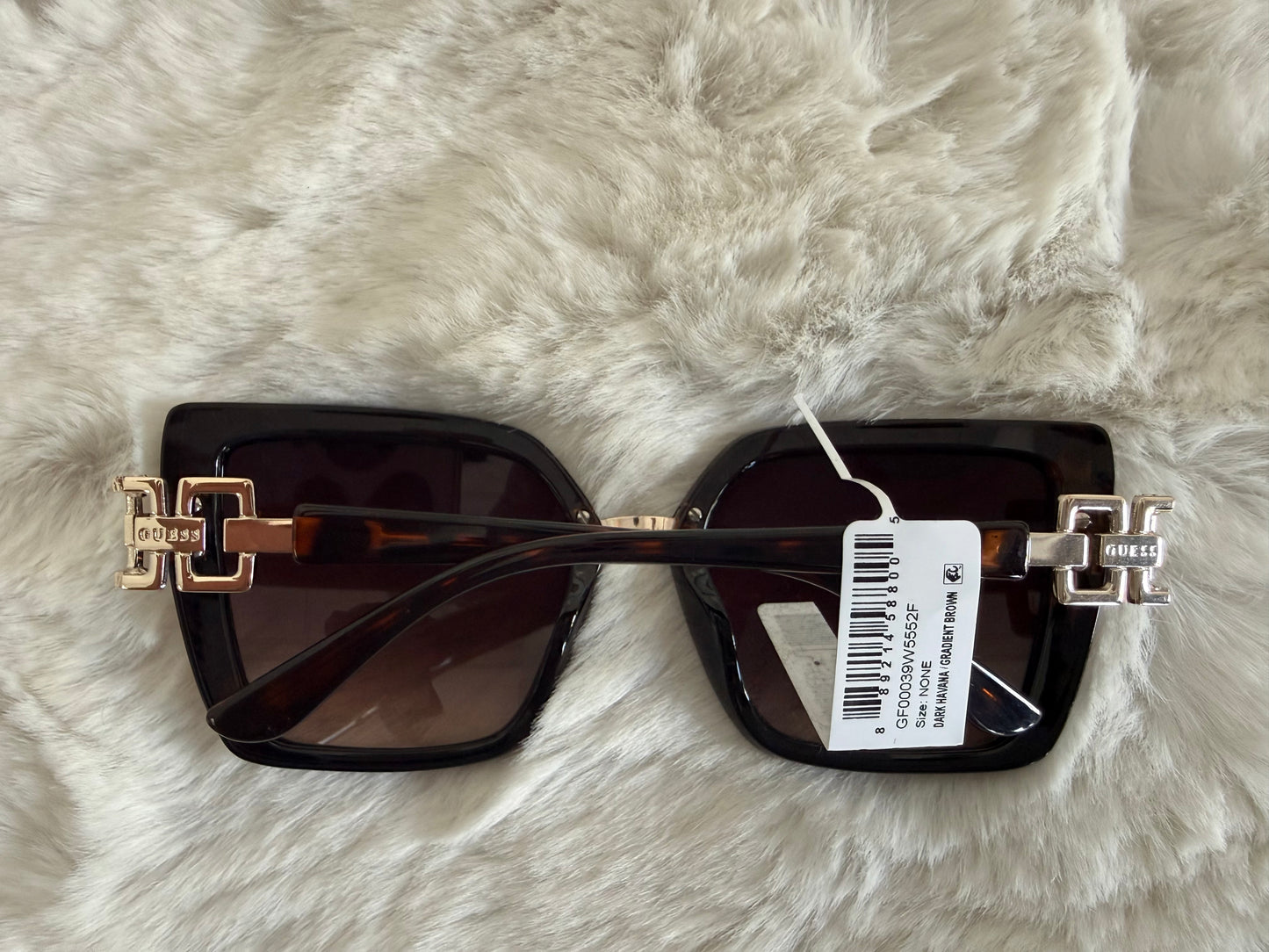 Lentes de dama marca Guess con estuche de bolsa