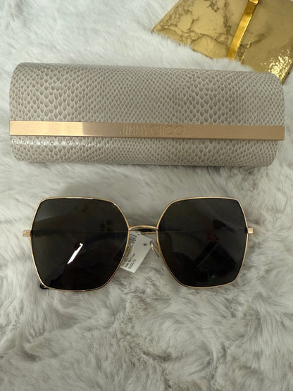 Lentes mica trasparente con aro dorado marca Jimmy choo