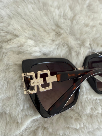 Lentes de dama marca Guess con estuche de bolsa