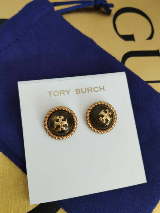 Aretes marca Tory Burch