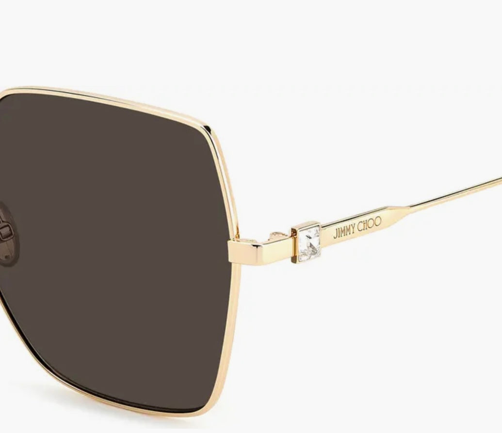 Lentes mica trasparente con aro dorado marca Jimmy choo