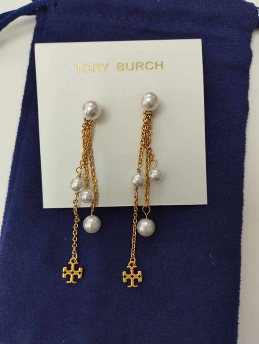 Aretes marca Tory Burch