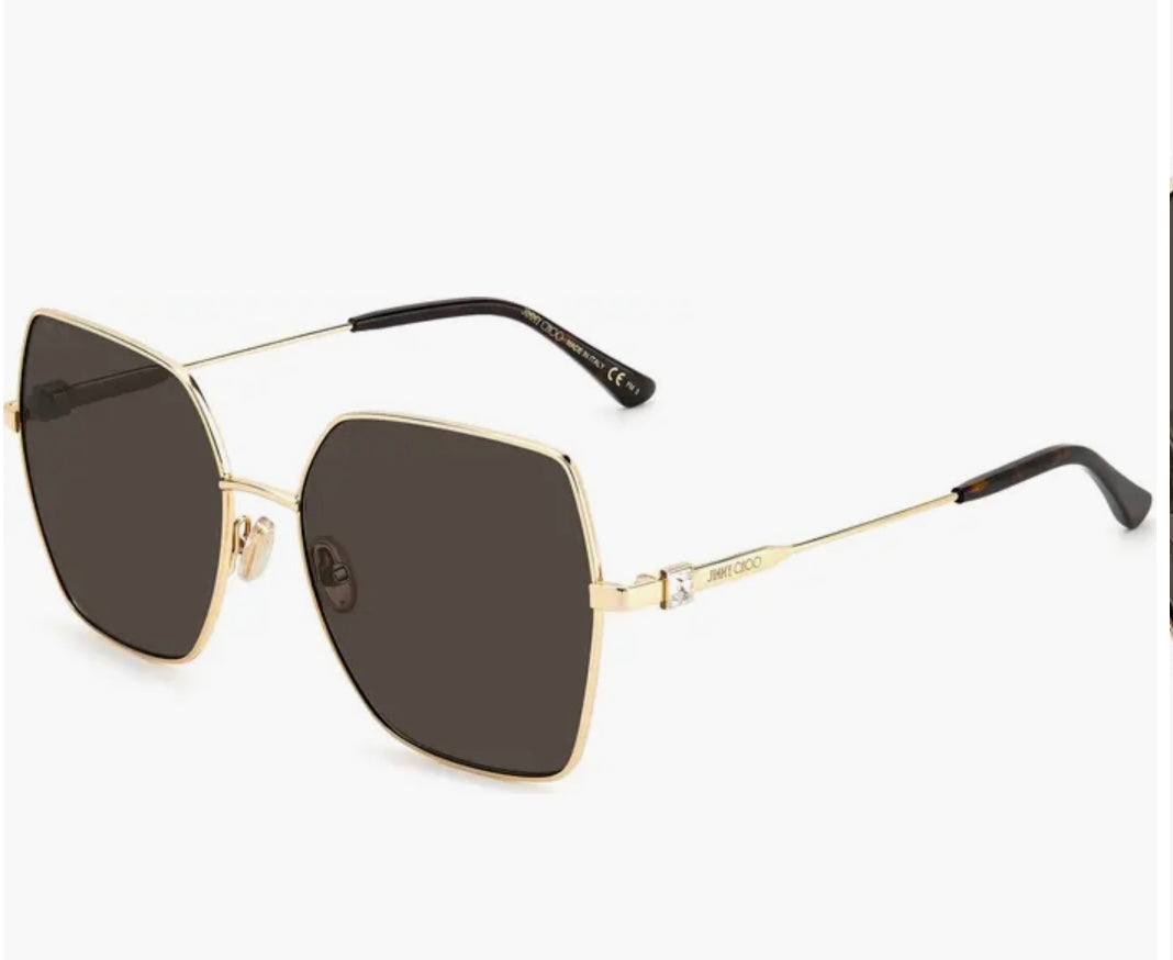 Lentes mica trasparente con aro dorado marca Jimmy choo