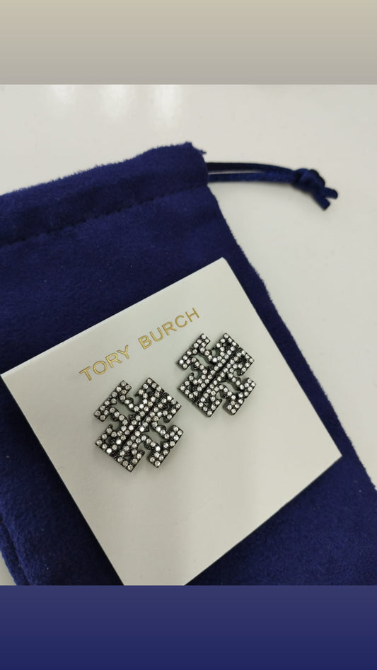 Aretes color plata con brillos marca Tory Burch