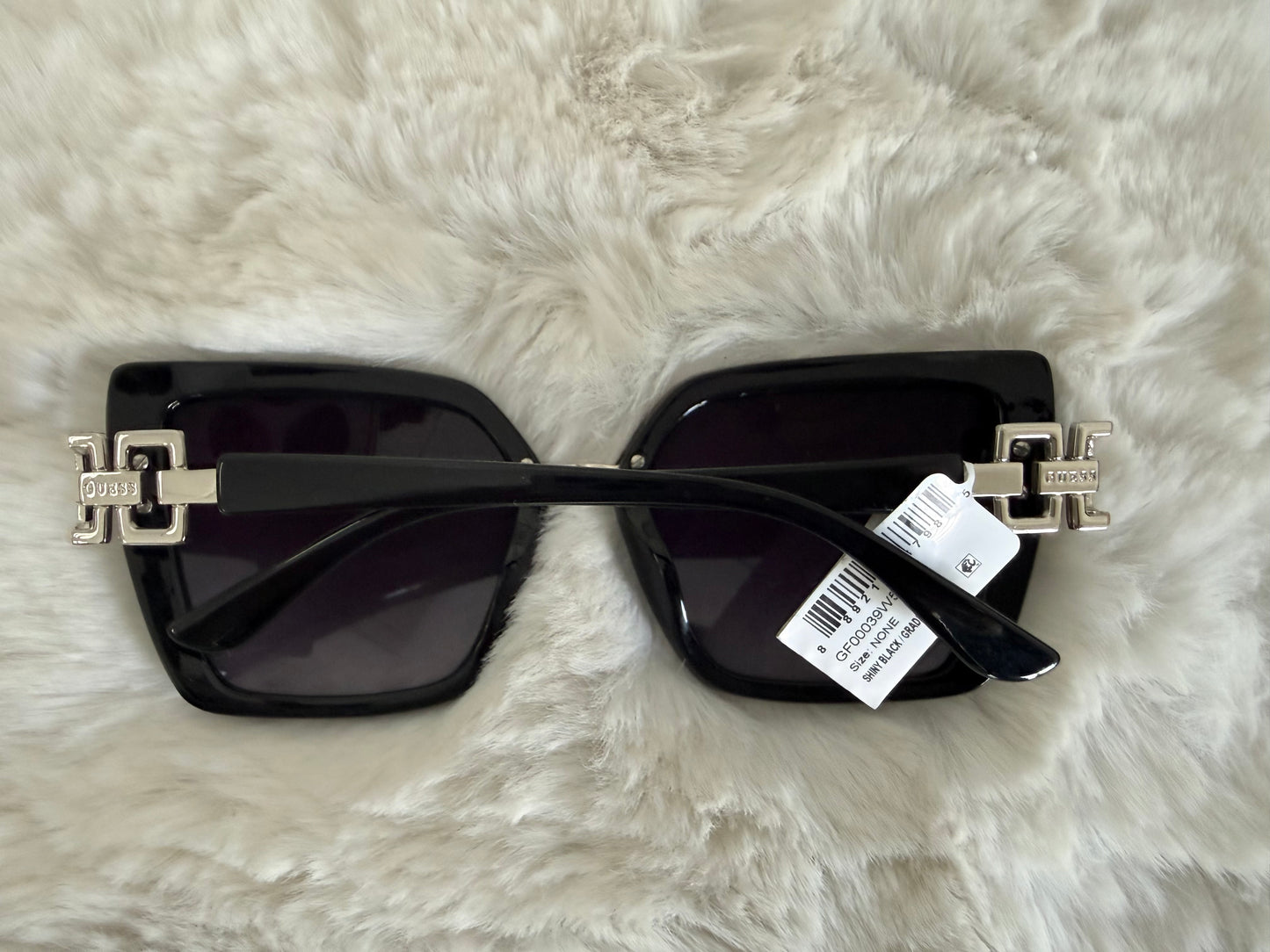 Lentes de dama marca Guess con estuche de bolsa