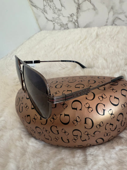 Lentes marca Guess con estuche de bolsa