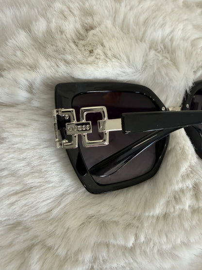 Lentes de dama marca Guess con estuche de bolsa