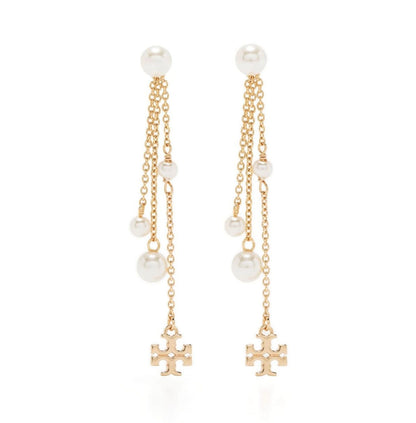 Aretes marca Tory Burch