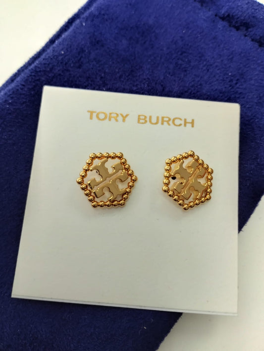 Aretes dorados marca Tory burch