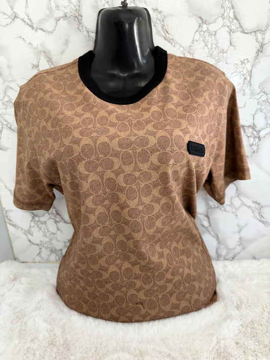 Blusa de dama marca Coach