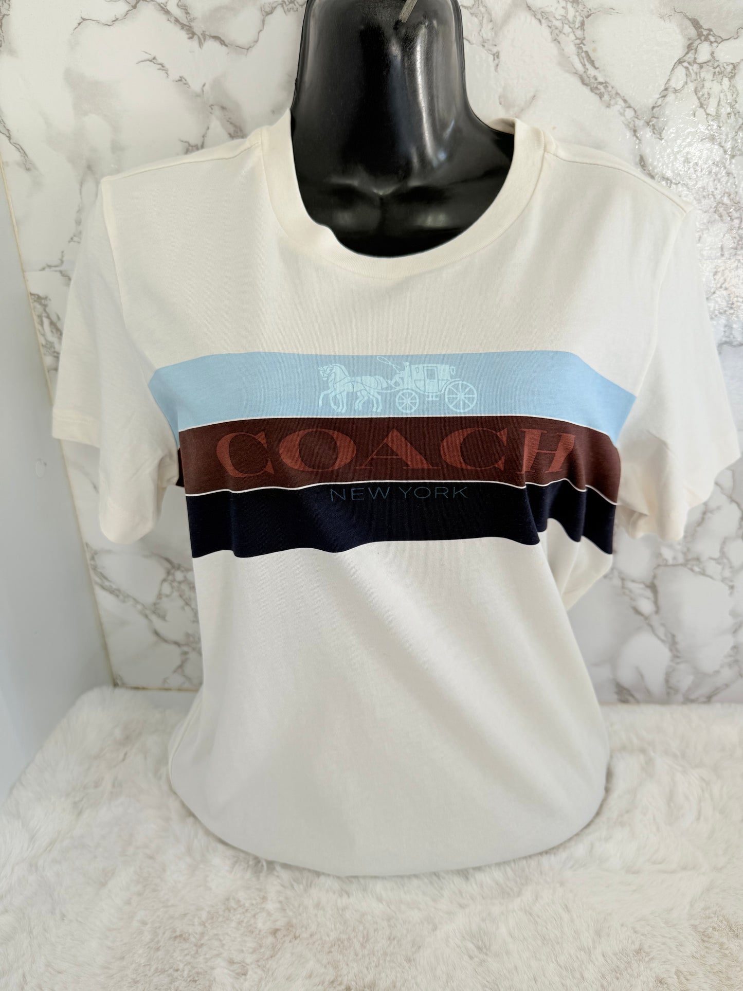 Blusa de dama marca Coach