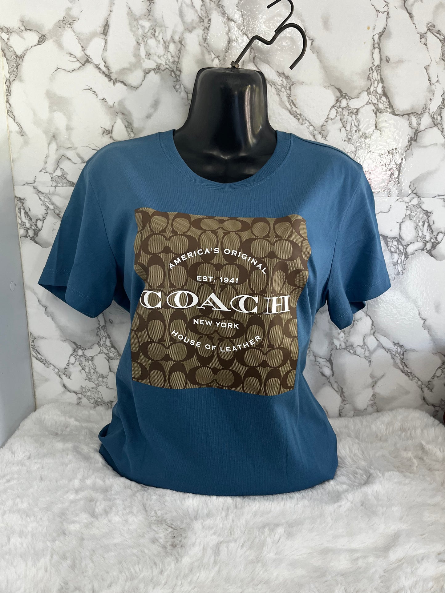 Blusa de dama marca Coach