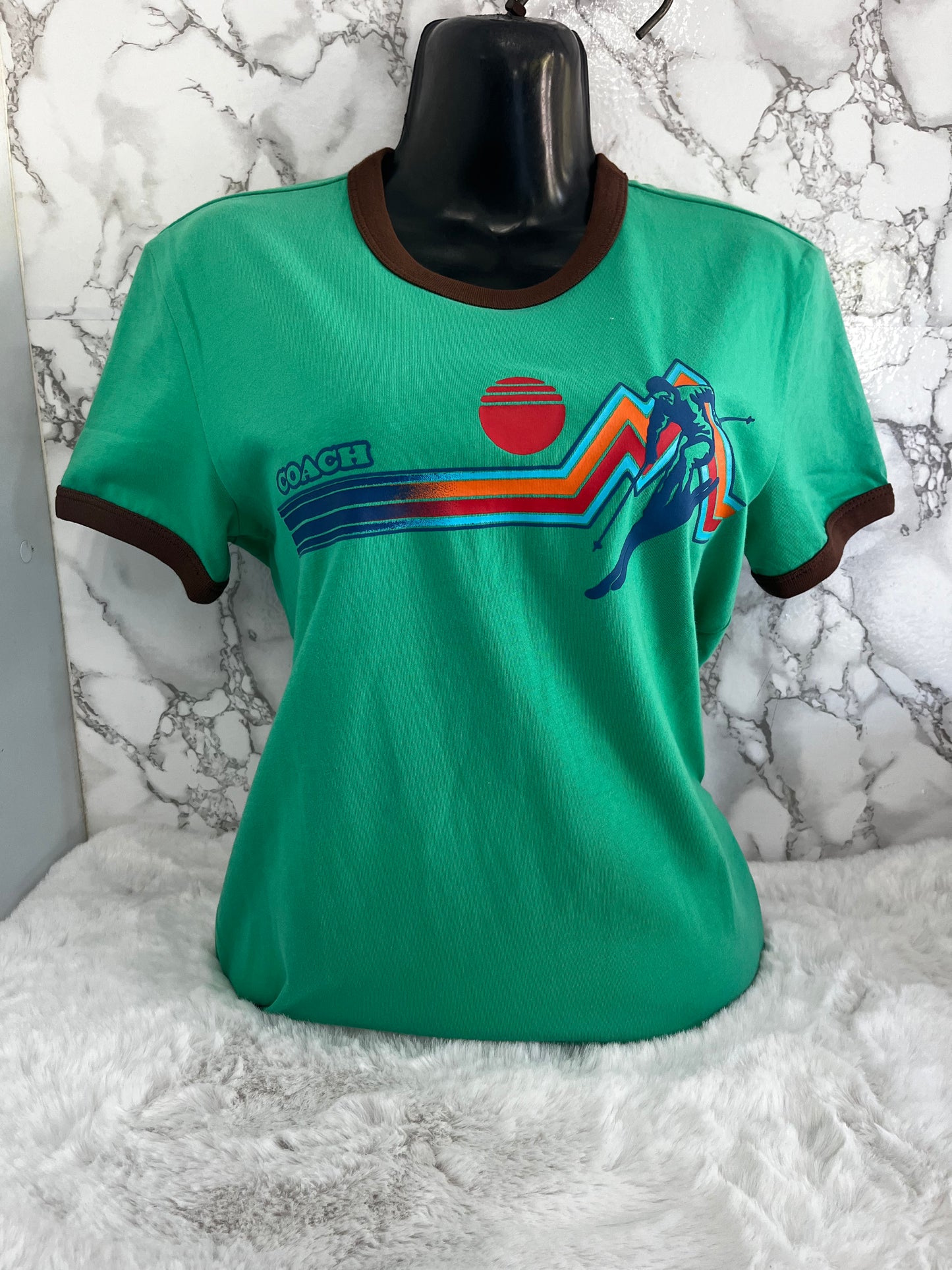 Blusa de dama marca Coach