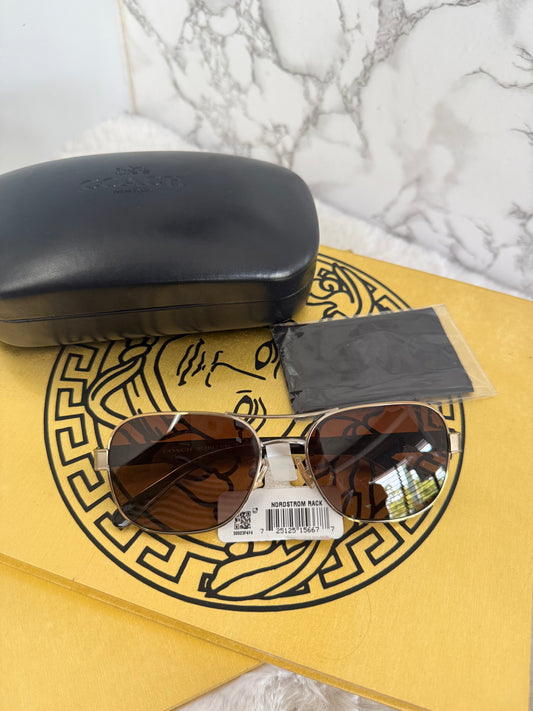 Lentes tipo aviador de dama marca Coach con estuche