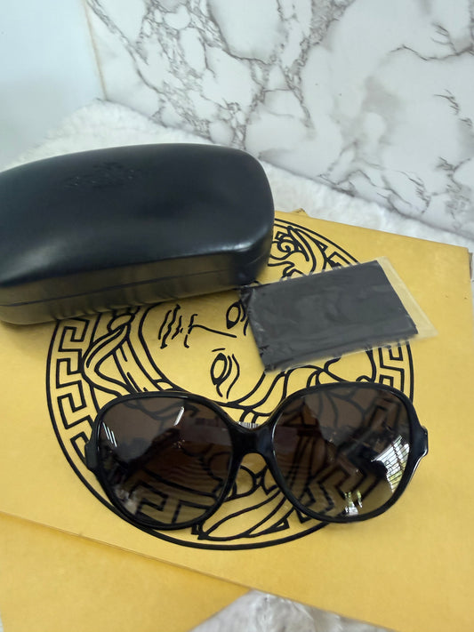 Lentes negro grande de dama marca Coach con estuche